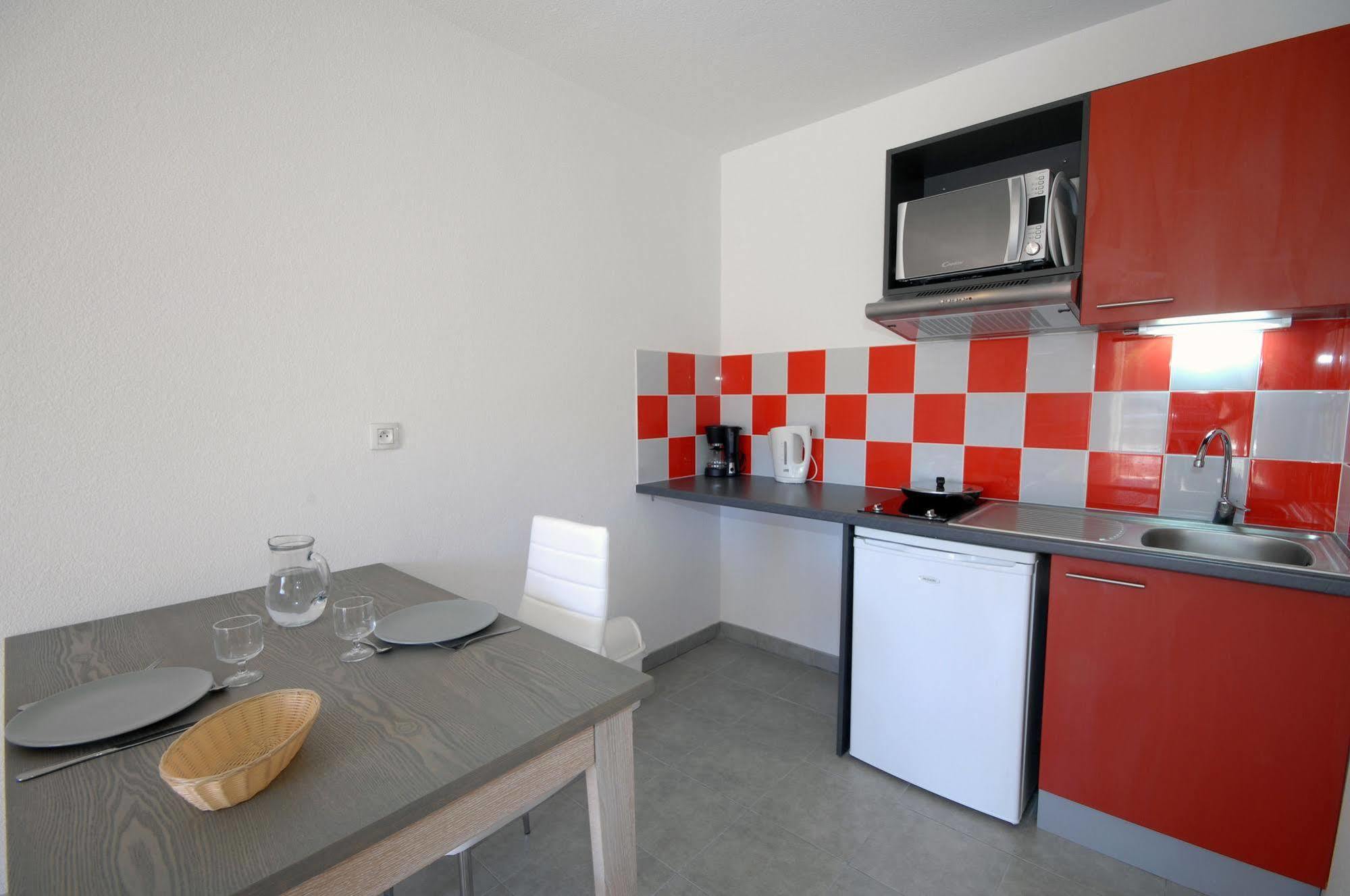 Residence De Tourisme Cote Green Juvignac Esterno foto